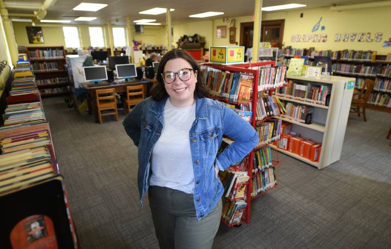 Children’s Librarian April Violette in the Children’s Room of the Wheeler Memorial Library that has been reopened after renovations.