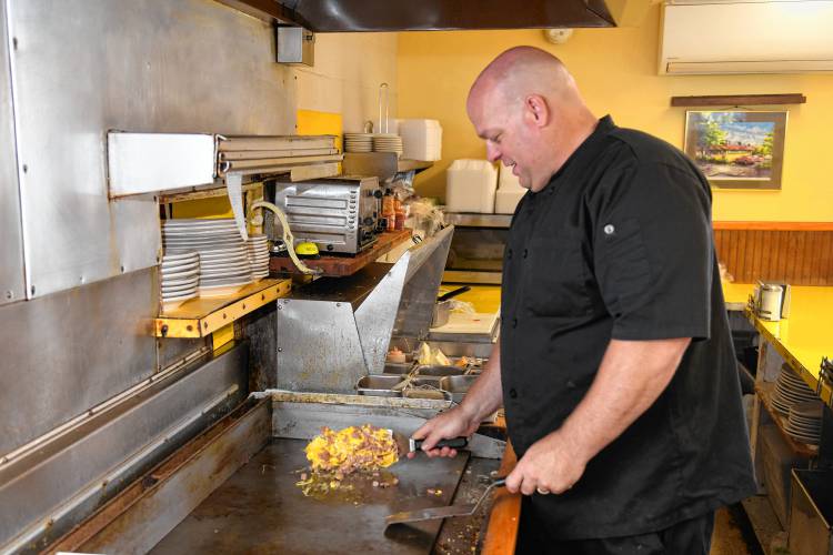 Charles Garbiel cooks up some eggs at the Shady Glen Diner on Avenue A in Turners Falls.