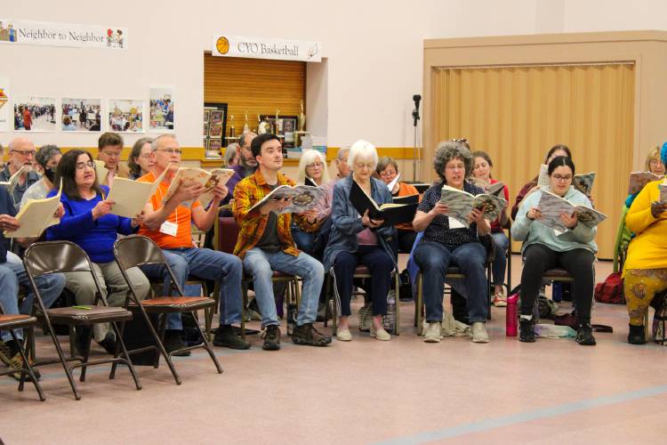 Members of the Pioneer Valley Symphony rehearse at Most Holy Redeemer Church in Hadley in advance of the Saturday, April 26, performance at Greenfield High School that will conclude the symphony’s 86th season.