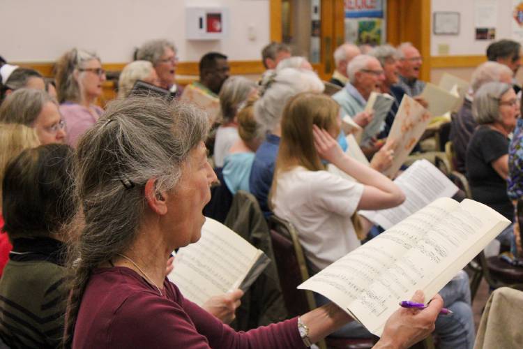 Members of the Pioneer Valley Symphony rehearse at Most Holy Redeemer Church in Hadley in advance of the Saturday, April 26, performance at Greenfield High School that will conclude the symphony’s 86th season.