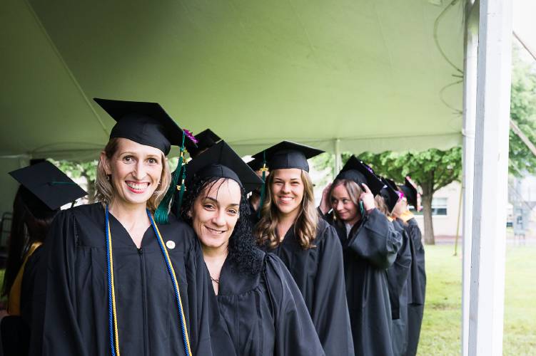 Greenfield Community College graduates are all smiles at Saturday’s commencement ceremony.