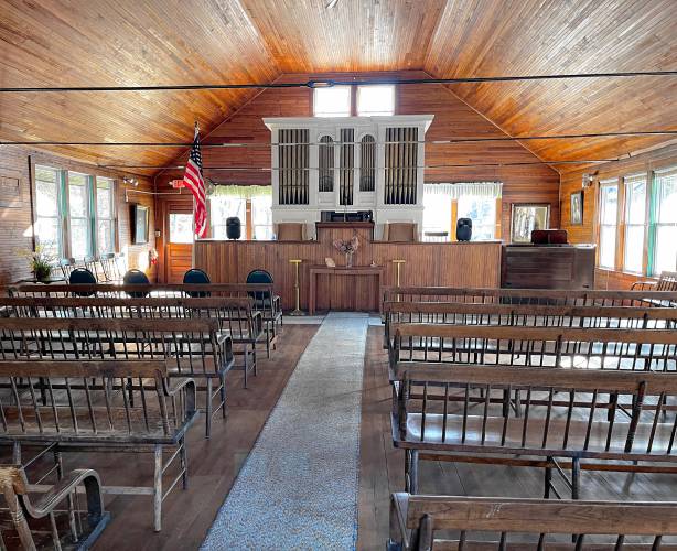 The upstairs level of the Tabor Thompson Memorial Temple where The National Spiritual Alliance holds Sunday services when the weather is warm (in the colder months, they hold services downstairs). The temple, built in 1920, is named for the reverend and medium who founded The National Spiritual Alliance in 1913.