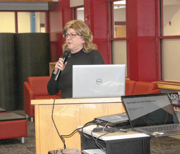 Michele Tontodonato, director of finance and operations for the Ralph C. Mahar Regional and Union 73 school districts, details the proposed fiscal year 2026 budget during a public hearing in the Eileen M. Perkins Library & Media Center on Thursday. Michele Tontodonato, director of finance and operations for the Ralph C. Mahar Regional and Union 73 school districts, details the proposed fiscal year 2026 budget during a public hearing in the Eileen M. Perkins Library & Media Center on Thursday.