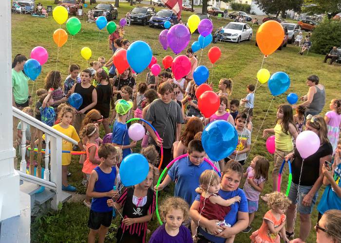 The Orange Community Band’s Children’s Night traditionally includes balloons and other treats for kids, including a march around the bandstand.