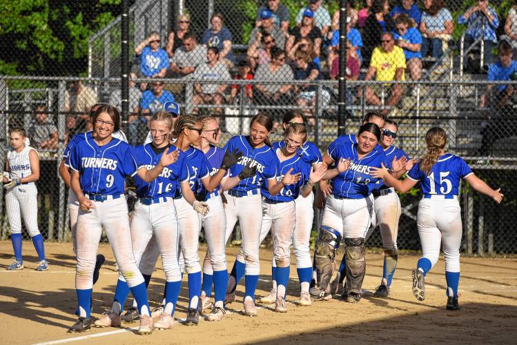 The Turners Falls softball team lines up for pregame introductions against Hopedale during the Thunder’s 4-1 victory in the MIAA Division 5 semifinal round on Wednesday night at Rockwood Field in Worcester.
