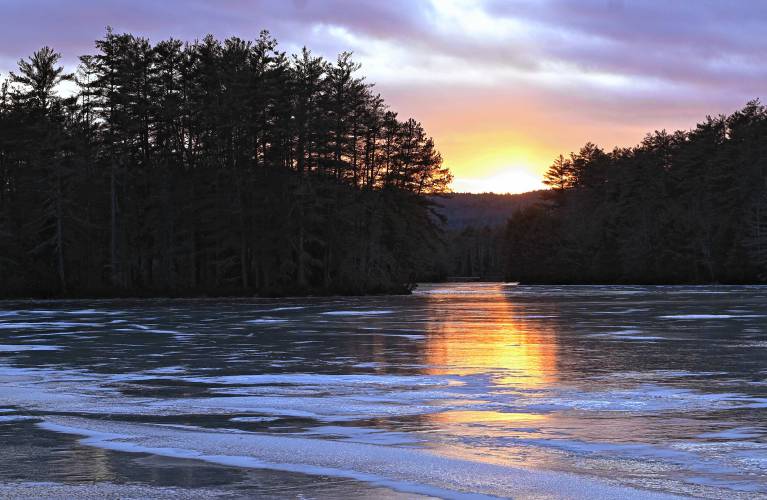 The sun sets over the Quabbin Reservoir in New Salem near the Gate 31 fishing access area on Wednesday.