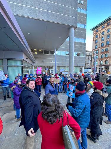 At left, U.S. Sen. Ed Markey’s Regional Director Jesse Lederman and U.S. Sen. Elizabeth Warren’s Regional Director Mark Antonio Williams, center, meet with roughly 75 political activists, including members of “Montague Resists,” outside of their regional offices in Springfield on Feb. 5. At left, U.S. Sen. Ed Markey’s Regional Director Jesse Lederman and U.S. Sen. Elizabeth Warren’s Regional Director Mark Antonio Williams, center, meet with roughly 75 political activists, including members of “Montague Resists,” outside of their regional offices in Springfield on Feb. 5.