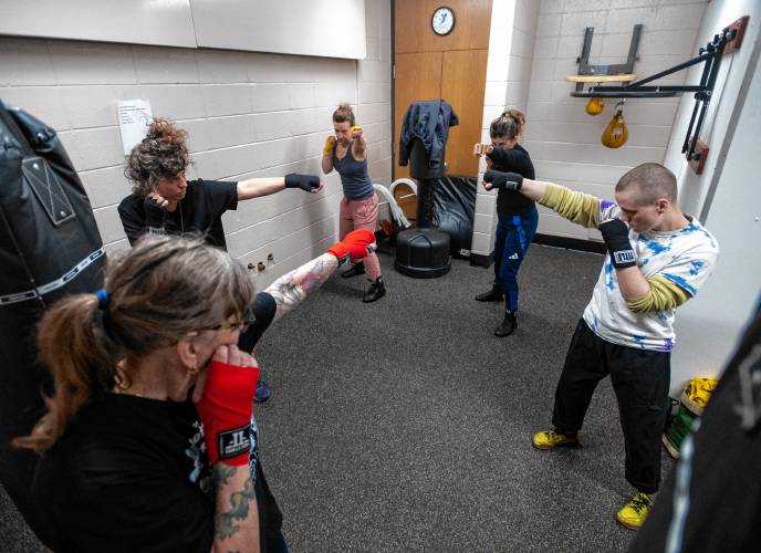 Instructor Vanessa Chakour, second from right, said her students support each other, build up each other’s confidence and help each other train to become better boxers.