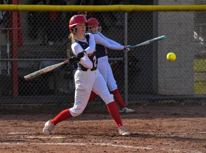 Frontier’s Whitney Campbell (2) takes a swing against Agawam during the Redhawks’ season opener on Friday at Zabek Field in South Deerfield.