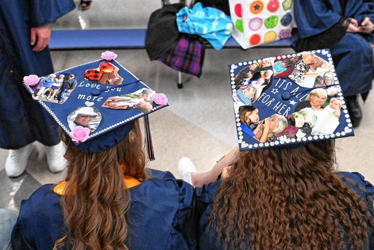 Frontier Seniors Madison McKemmie and Hailey Hutkoski pay tribute to their grandparents on their mortar boards to Frontier Regional School graduation on Friday Night in South Deerfield.