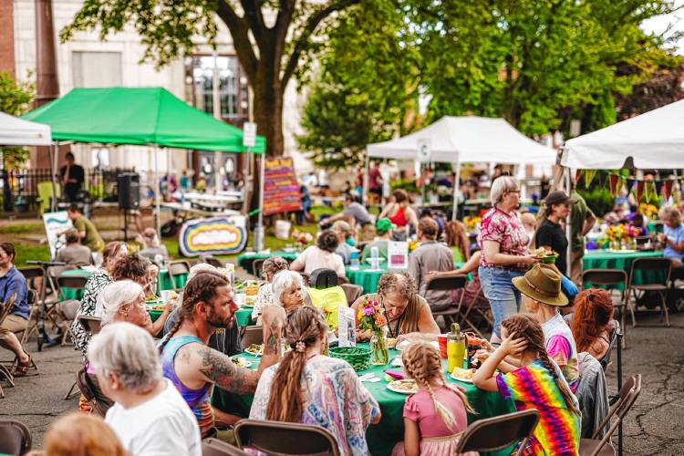 Diners enjoy their meals at the 2023 Harvest Supper on the Greenfield Common. Diners enjoy their meals at the 2023 Harvest Supper on the Greenfield Common.
