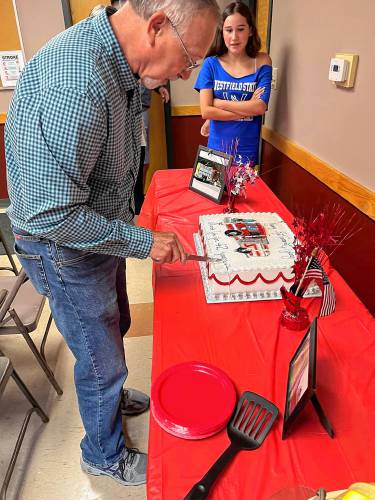 Montague Center Assistant Fire Chief Gary Dion celebrating his retirement after 42 years of service on the Fire Department.