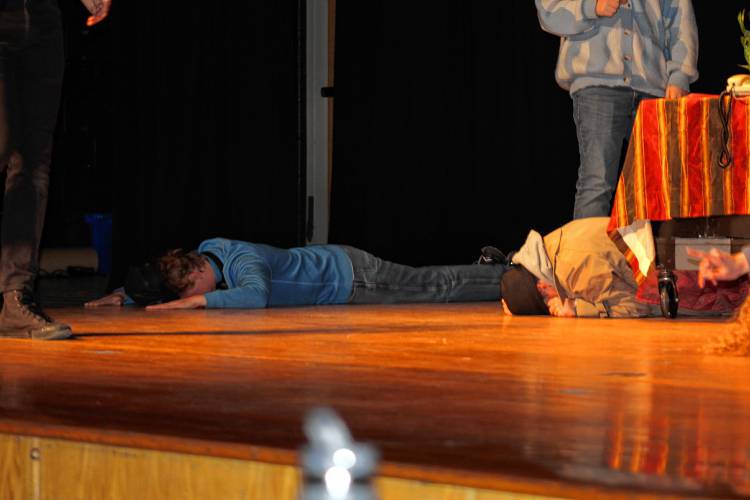 Mohawk Trail Regional School students rehearse for their upcoming performance of “And Then There Was One,” a murder mystery following 10 individuals invited to a mansion on a small island, who then die one by one until only one person is left.