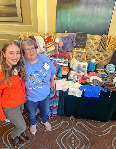 RegalCare Regional Activities Director Kara O’Leary, at left, poses for a photo with Sue Lahoski, RegalCare at Greenfield’s activity director, during the facility’s holiday craft fair on Saturday, Nov. 11. Lahoski brought in handmade items from her shop, “Wrapped in Nonno’s Love.”