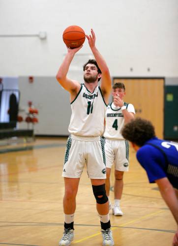 Greenfield’s Jonathan Breor (11) sinks a foul shot against Wahconah in the second quarter Saturday night in Greenfield.