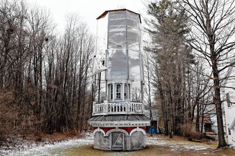 The belfry and cupola from Ashfield Town Hall rests on the ground behind the building, waiting to be repaired and put back.