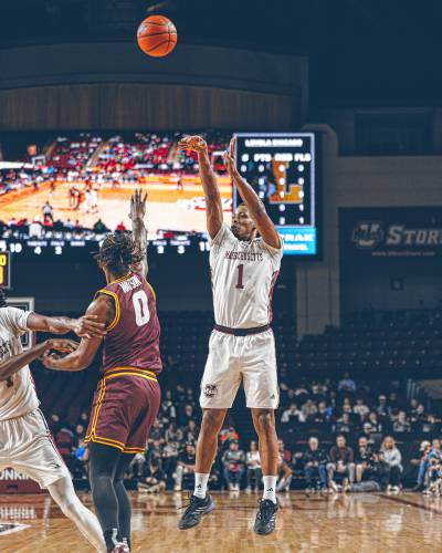 UMass junior forward Daniel Hankins-Sanford (1) shoots a 3-pointer during the first half of the Minutemen’s 00-00 loss to Loyola Chicago on Saturday afternoon at Mullins Center in Amherst.