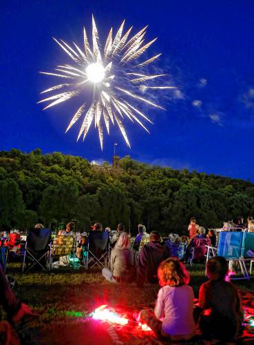 Hundreds gather at Beacon Field in Greenfield in 2018 to watch the fireworks launch from Poet’s Seat Tower. In its annual effort to raise $20,000 for the city’s Independence Day fireworks celebration, the Recreation Department will host three different fundraising events between this Friday and June 26. Hundreds gather at Beacon Field in Greenfield in 2018 to watch the fireworks launch from Poet’s Seat Tower. In its annual effort to raise $20,000 for the city’s Independence Day fireworks celebration, the Recreation Department will host three different fundraising events between this Friday and June 26.