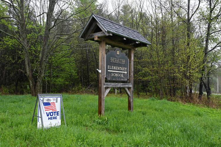 Heath residents cast their ballots at the former Heath Elementary School, now the Jacobs Road Municipal Center, on Friday.