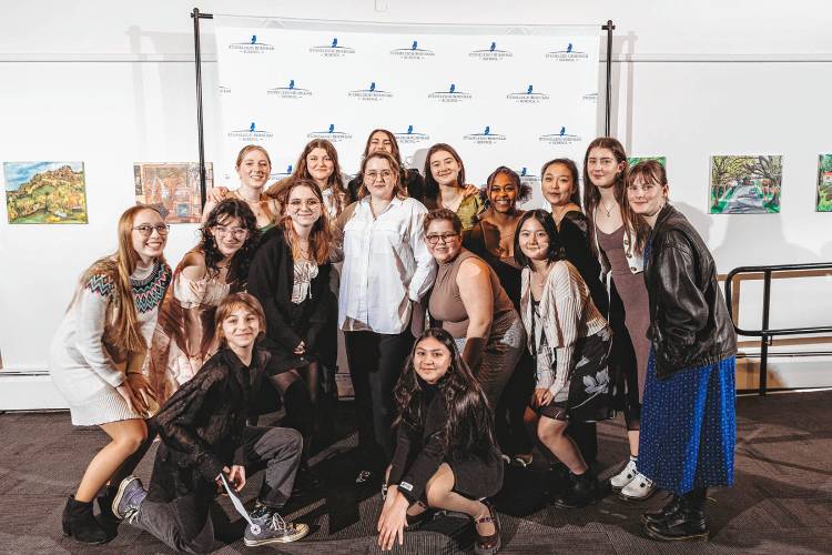Caitlin Kinnunen with Stoneleigh-Burnham School's cast and crew for 