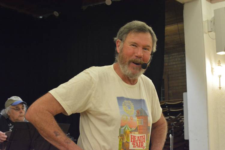 Doug Wilkins, who’s been calling square dances for 40-plus years, last month calling a dance in Ashfield.