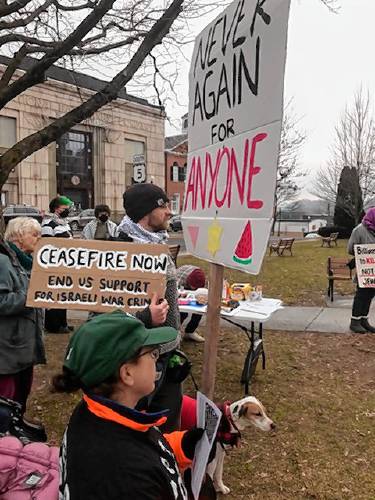 Residents participate in the weekly peace gathering on the Greenfield Common. Local organizers and activists are planning to bring forward a resolution calling for a cease-fire in Gaza to the Greenfield City Council as early as the body’s March meeting.