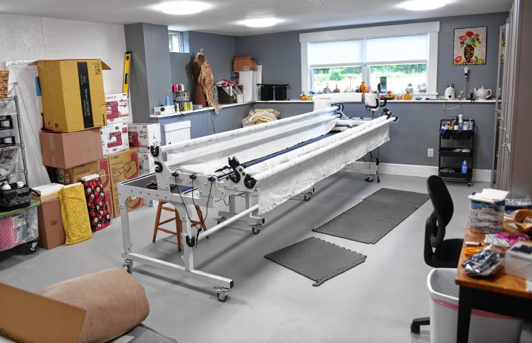 A long-arm quilting machine in the studio space at the Where We Create quilt shop and studio in Bernardston. 