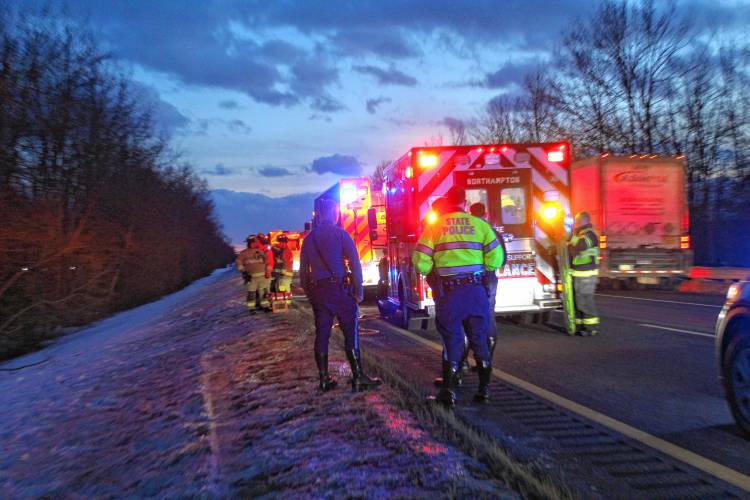 Firefighters and State Police troopers respond to a single-vehicle crash along Interstate 91 Friday evening that injured a 53-year-old Chicopee man.