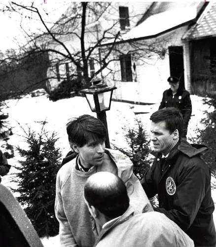 Randy Kehler is arrested for trespassing at his former home in Colrain on Dec. 3, 1991, after the house had been seized for failure to pay federal income taxes.