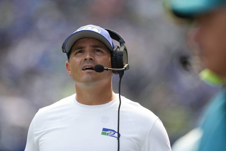 Seattle Seahawks head coach Mike Macdonald reacts during the first half of an NFL football game against the Denver Broncos, Sunday, Sept. 8, 2024, in Seattle. (AP Photo/Lindsey Wasson)