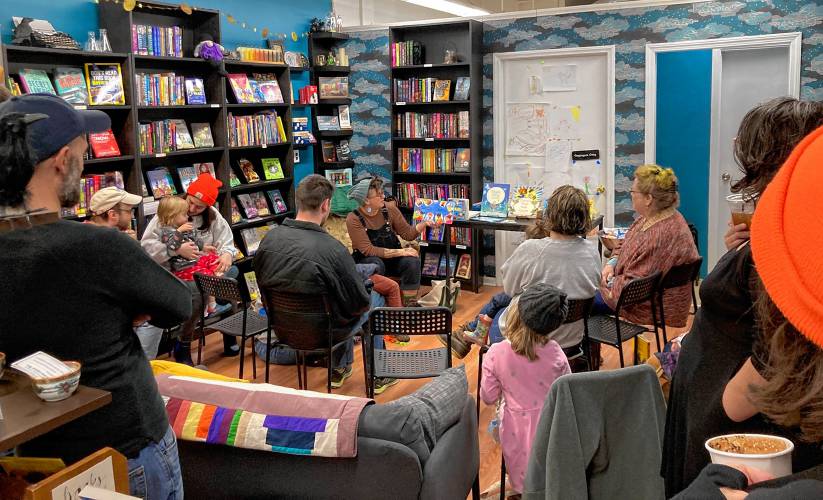 Local author MK Smith Despres reads to attendees at The Imaginary Bookshop in Greenfield during one of the store’s community events.