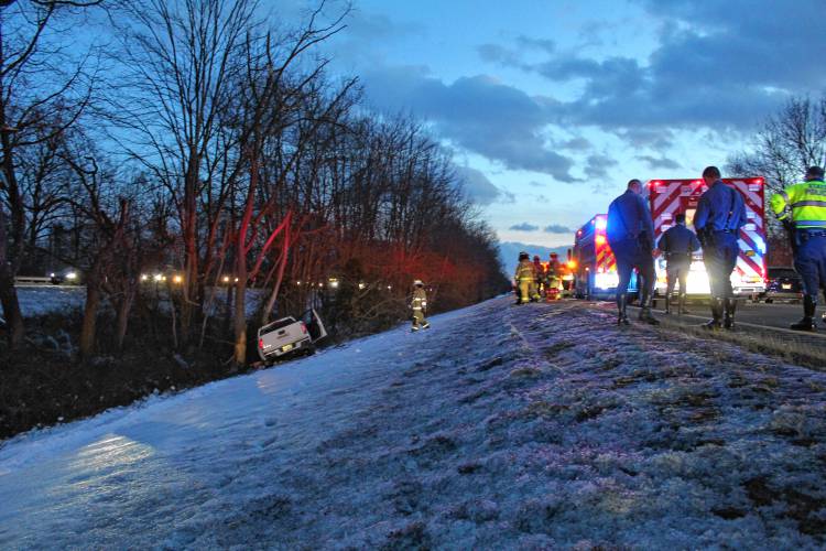 Firefighters and State Police troopers respond to a single-vehicle crash along Interstate 91 Friday evening that injured a 53-year-old Chicopee man.