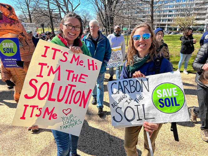 Sarah Voiland marches with a new friend, Janet Aardema, of Broadfork Farm in Virginia, during a Farmers for Climate Action rally in Washington D.C., organized by the National Sustainable Agriculture Coalition.