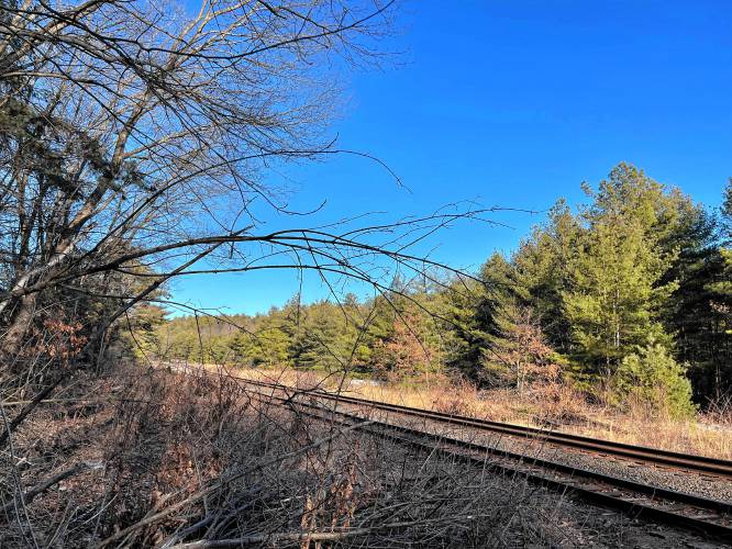 The site of the Fitchburg Railroad Co. railway station, built in 1872. After a 1907 fire, the railway station moved to The Bluffs section of Lake Pleasant and became part of the relocated Lake Pleasant Inn.