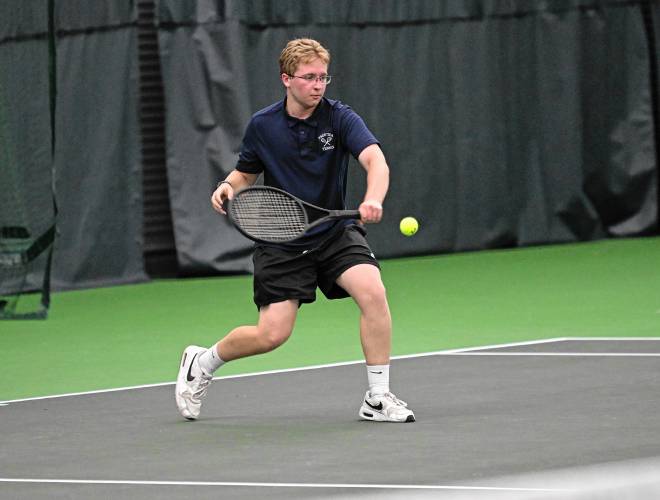 Frontier’s Robert Fuqua returns a volley against Nantucket in an MIAA Div. 4 Round of 32 match at Deerfield Academy on Thursday. 