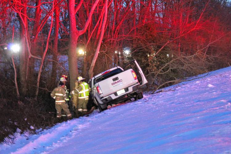 Firefighters and State Police troopers respond to a single-vehicle crash along Interstate 91 Friday evening that injured a 53-year-old Chicopee man.