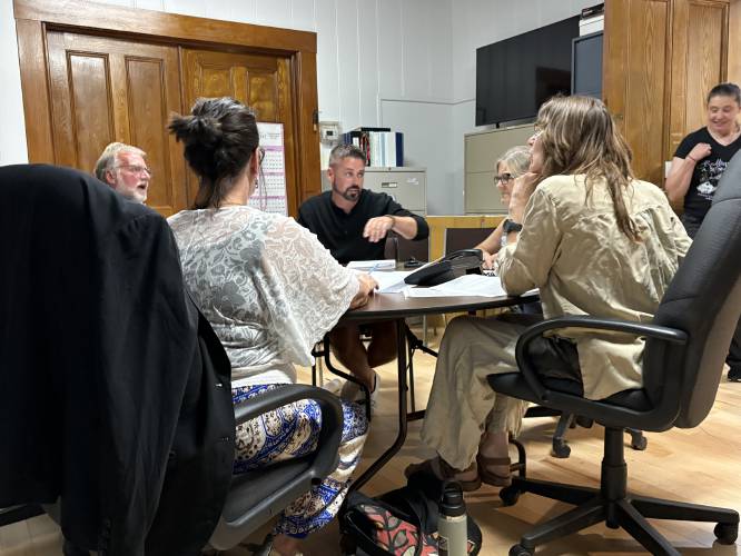Charlemont Planning Board members review Travis DeCere’s plans for the Oxbow Resort on Route 2.