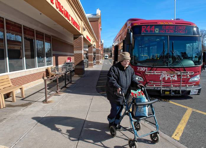 Laura Oldham of Northampton rushes off the bus to get her shopping done at the Big Y store in Northampton. Oldham counts on public transportation to do her shopping. She doesn’t like to be away from home for long, so she has to fit trips to Walmart and Big Y into one hour; otherwise, she has to wait over two hours to get a bus home. “It’s nice when they have more service,” said Oldham. “Sometimes I just can’t fit the Big Y stop in.”