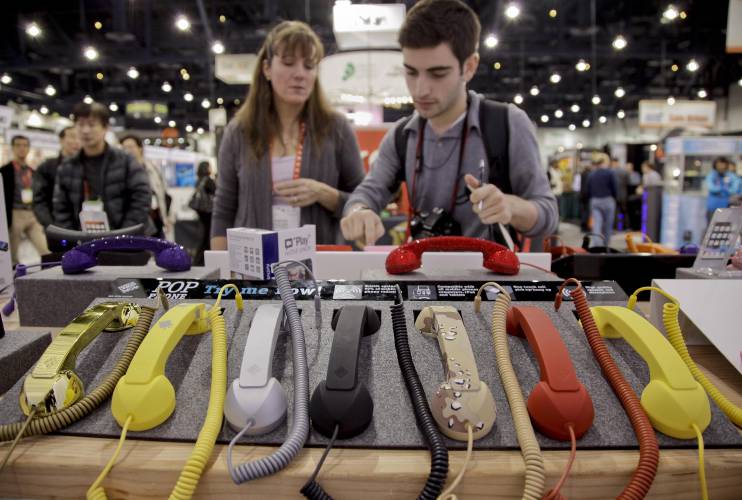 Cell phone hand sets are seen on display at the 2012 International Consumer Electronics show, Friday, Jan. 13, 2012, in Las Vegas. As a Thursday, Feb. 22, 2024, cell phone outage shows, sometimes landline telephones can come in handy, and were suggested as part of the alternatives when people’s cell phones weren’t working.