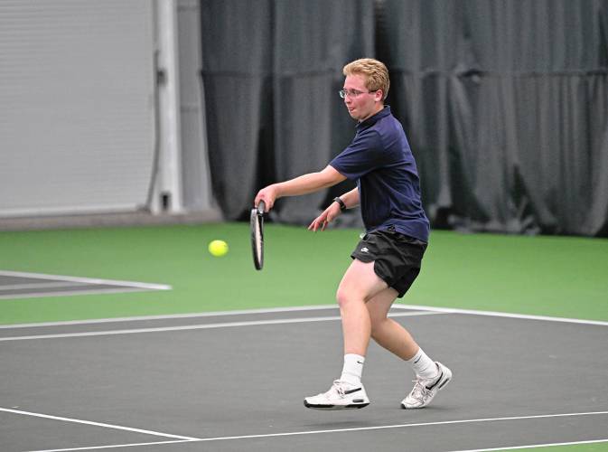 Frontier’s Robert Fuqua returns a volley against Nantucket during an MIAA Div. 4 Round of 32 match at Deerfield Academy on Thursday. 