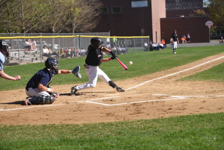 Pioneer's Ethan Quinn puts the bat on the ball against Frontier on Wednesday in South Deerfield. 