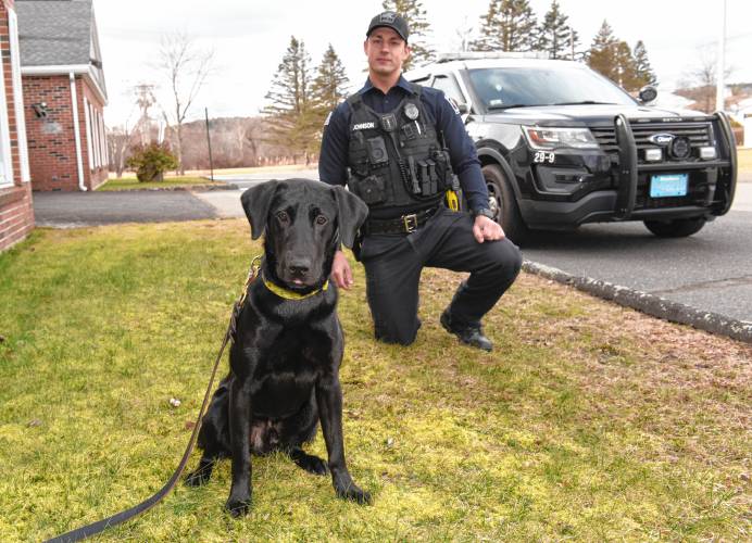 Orange K-9 Officer Kyle Johnson with the department’s newest K-9, Swoop, outside the Police Station.