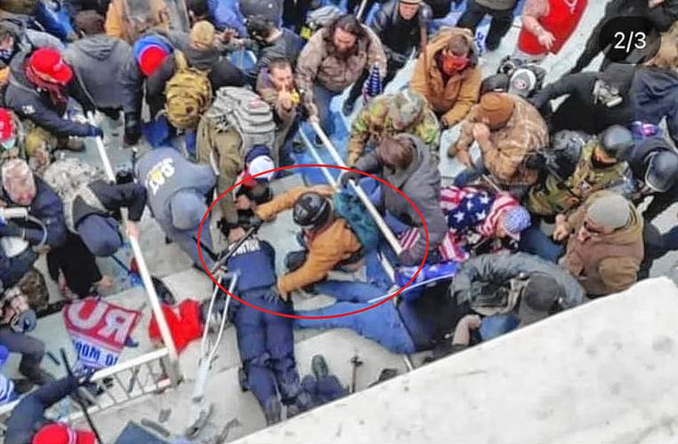 Jeffrey Sabol is assaulting a prone police officer during the attack on the Capitol on Jan. 6, 2021, in Washington.