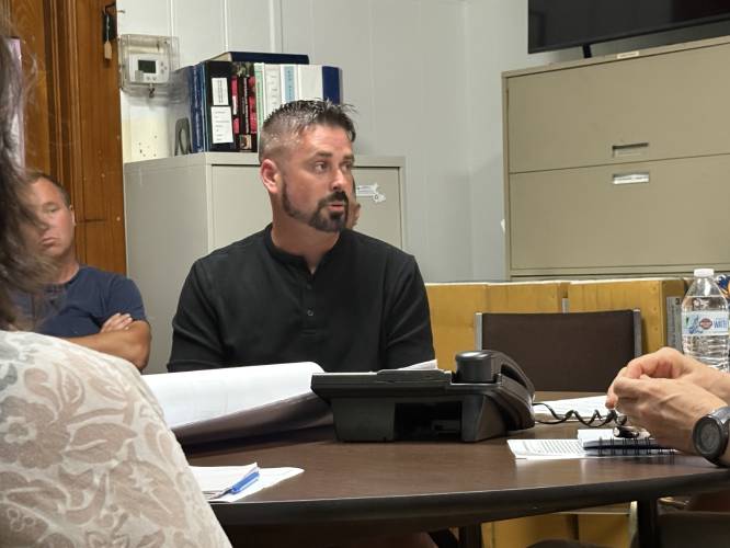 Travis DeCere received a special permit from the Planning Board on Thursday to offer both traditional motel rooms and longer month-to-month stays at the Oxbow Resort in Charlemont.