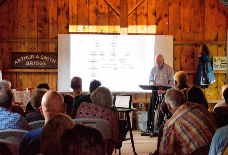 Catamount Hill Association historian Prentice Crosier gives a presentation on the 1875 murder of Civil War veteran Joseph Riley Farnsworth during a Colrain Historical Society program on June 13 at the Stacy Barn.