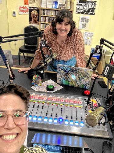 DJ Bucky Downtown, front, takes a selfie with DJ Merqueen, the guest DJ on the first episode of “Queer Yenta Radio Hour.”