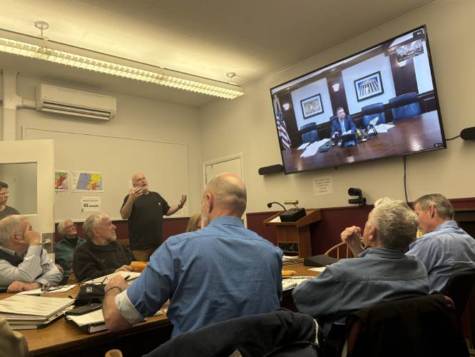 Greenfield Zoning Board of Appeals members listen to testimony Thursday from attorney Andrew Campanelli regarding a proposed cell tower. Greenfield Zoning Board of Appeals members listen to testimony Thursday from attorney Andrew Campanelli regarding a proposed cell tower.