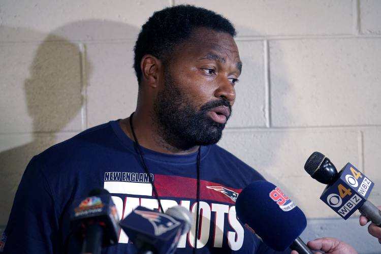 Patriots coach Jerod Mayo faces reporters back in 2022. The team has agreed to hire Mayo to succeed Bill Belichick as their next head coach.