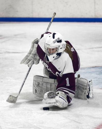 Easthampton goalkeeper Paige Galpin (1) reels in a glove save against Greenfield in the second period Saturday night at Collins-Moylan Arena in Greenfield.