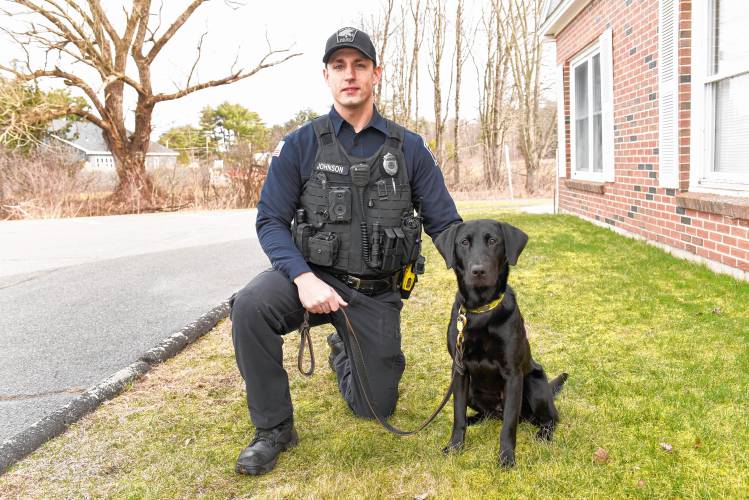 Orange K-9 Officer Kyle Johnson with the department’s newest K-9, Swoop, outside the Police Station.
